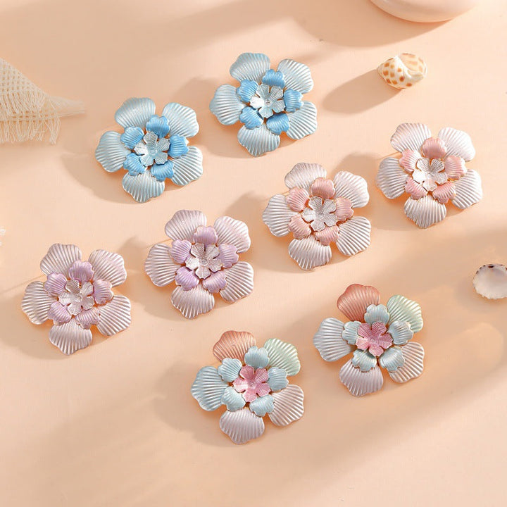 Ladies' flower earrings with intricate design and glossy accents Land Girl
