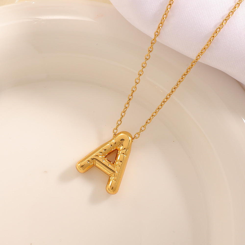 Women's necklace with curved letter pendant Land Girl
