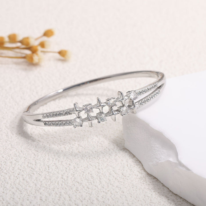 Women's bangle with elegant infinity pattern and sparkling zirconia Land Girl