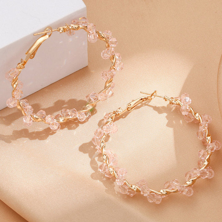 Ladies hoop earrings with luxurious pearl accents and elegant, twisted design Land Girl