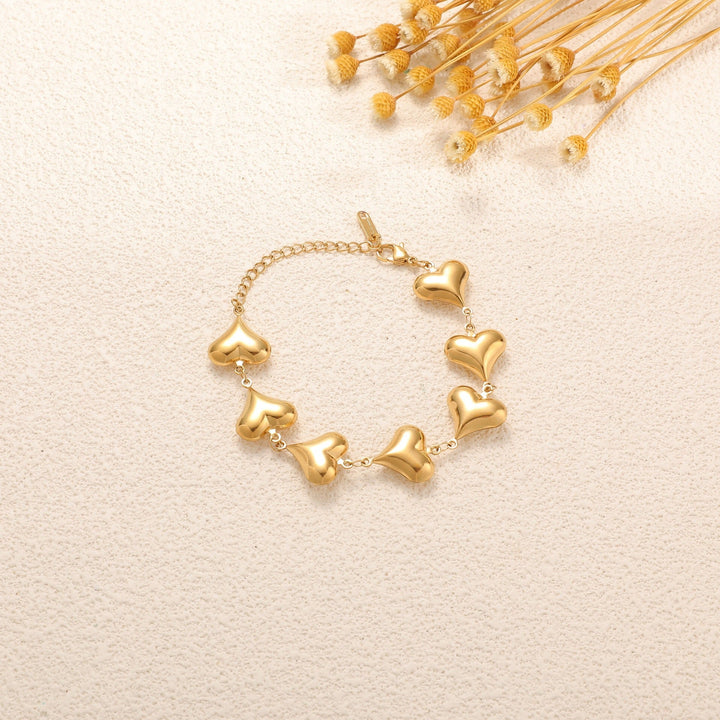 Ladies' bracelet with elegant heart design and fine link chain Land Girl