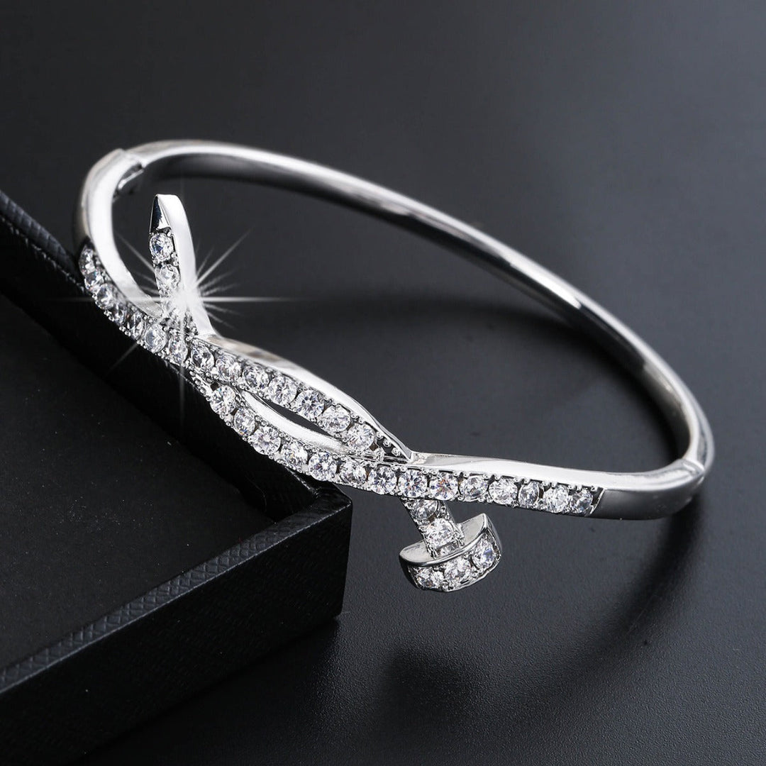 Women's bangle with elegant infinity pattern and sparkling zirconia Land Girl