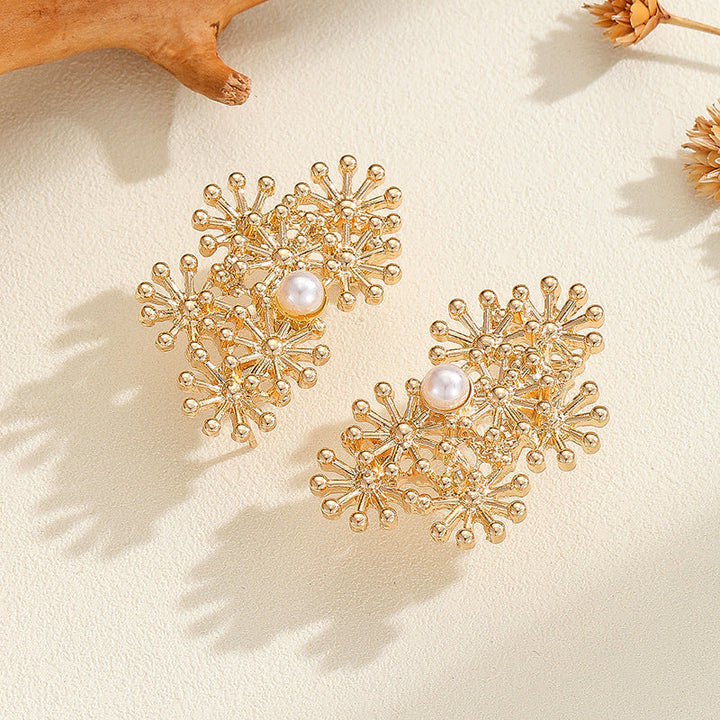 Women’s ear clips with elaborate flower design and pearl accent Land Girl