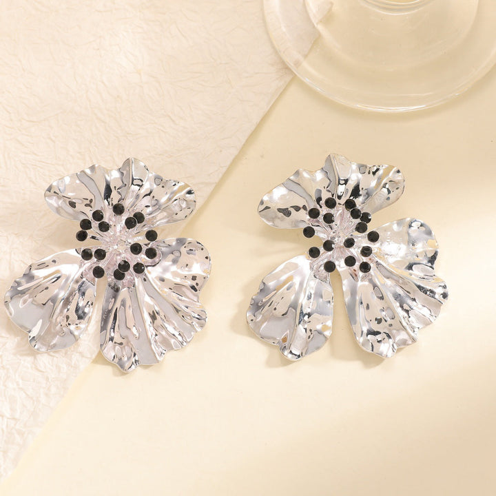 Women’s metal flower earrings with sparkling red accents Land Girl